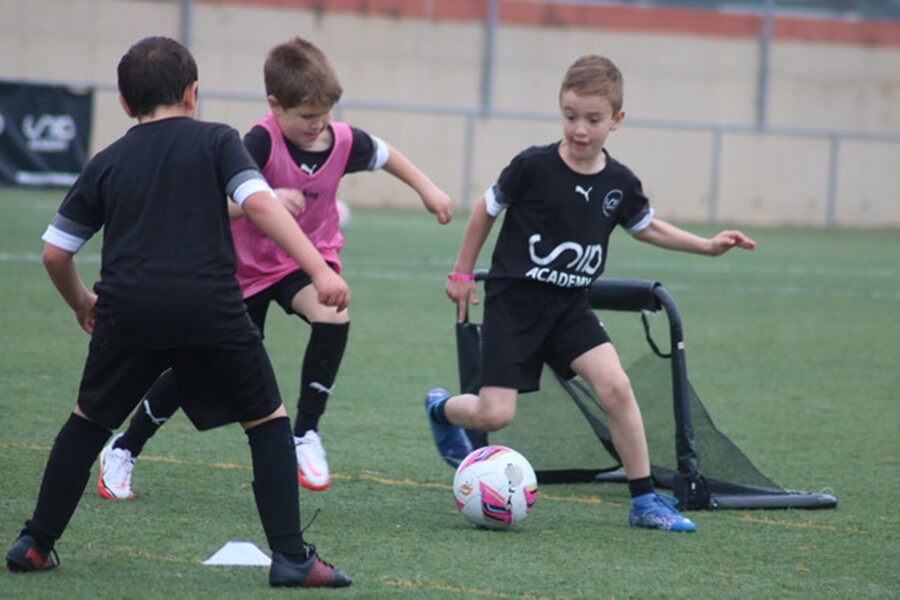 Overview - Sports International Football Camp with members of the