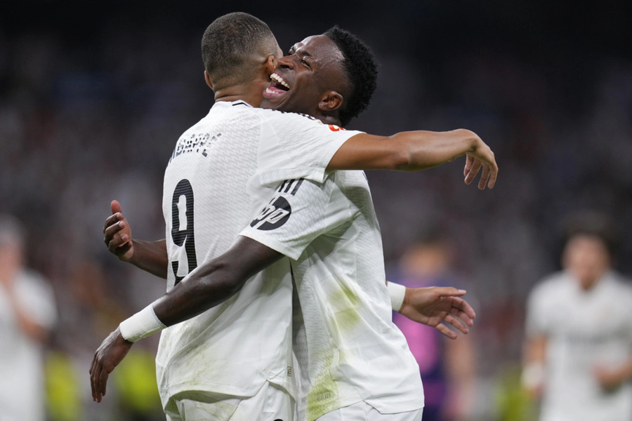 Mbappe y Vinicius celebrando con el Real Madrid.